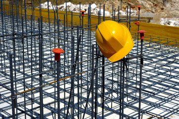 Helmet and protection caps for reinforcing bars on building site