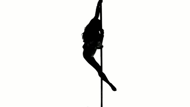 one caucasian woman pole dancer dancing in silhouette studio