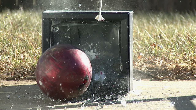 Bowling Ball vs. Television. An old analog/standard definition television set is destroyed as a make-shift wrecking ball made from a rope, a screw and a bowling ball. Shot in slow motion at 60fps.