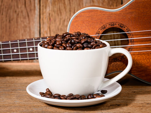 coffee cup and coffee beans and Ukulele