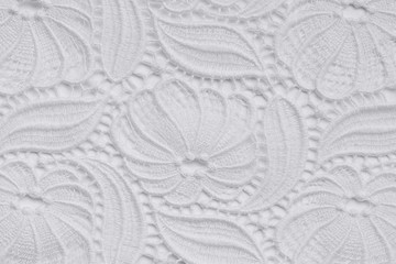 White lace over white background