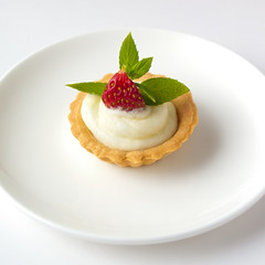 Tiny cupcakes with strawberry, whipped cream, mint