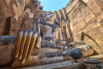 Big Buddha in ruin temple at Sukothai Historical Park, Thailand