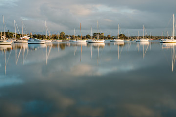 Fototapeta na wymiar Boats on a marina in the morning