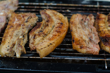 grilling pork in  market .