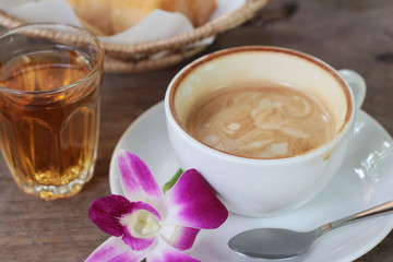 Hot latte coffee and hot tea with toast.