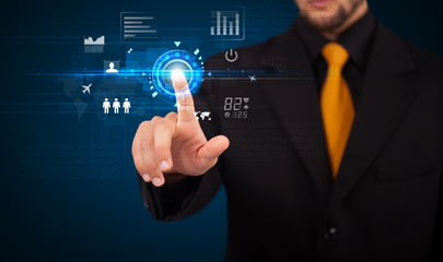 Handsome businessman touching future web technology buttons and