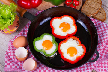 Fried eggs in peppers