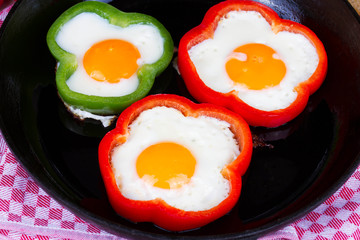 Fried eggs in peppers