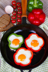 Fried eggs in peppers