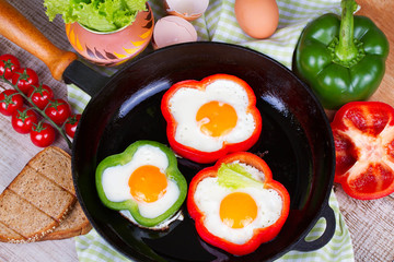 Fried eggs in peppers