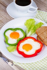 Fried eggs in peppers