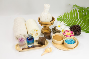 Fototapeta na wymiar Spa massage setting with towels compress balls and herb