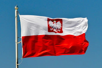 Naklejka na ściany i meble Polish national flag in the sky.