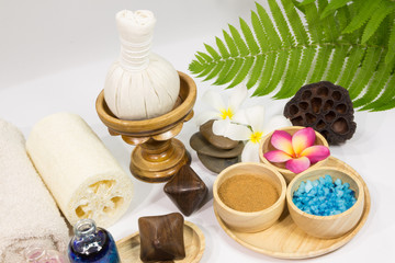 Spa massage setting with towels compress balls and herb