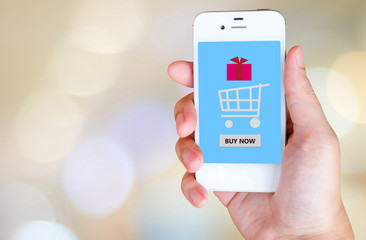 Buy now on smart phone screen in hand, e-business concept