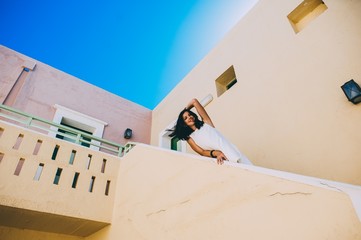 girl walking on stairs in hotel room