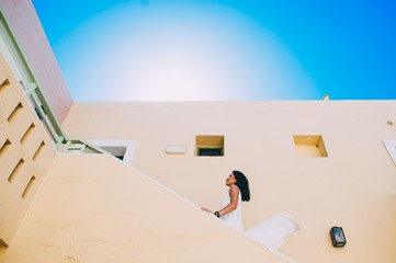 girl walking on stairs in hotel room