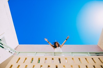 girl walking on stairs in hotel room