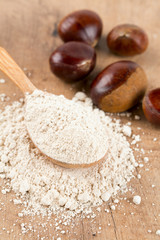 chestnut flour in a wooden spoon