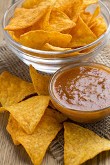 tortilla chips and tomato dip in a bowl