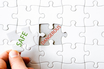 Missing jigsaw puzzle piece with word SAFE