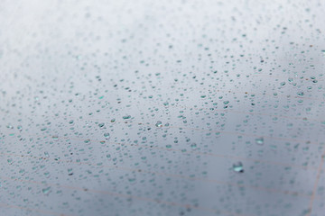 close up of wet rear car glass