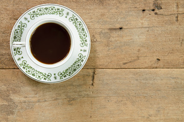 Coffee on wooden plank background