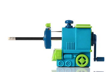 Mechanical sharpener of pencil on the white background