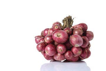 Shallot onions in a group on White