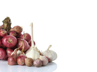 Shallot onions in a group on White
