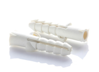 plastic dowels on white background