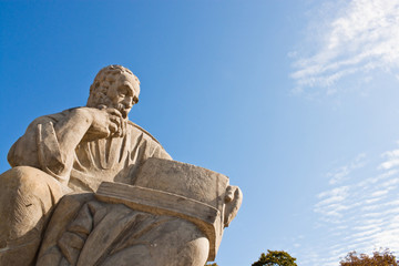 Statue of Aristophanes in amphiteatre in Lazienki park, Warsaw - 83502102