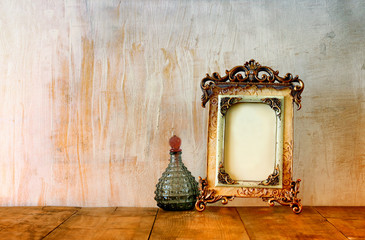 Image of victorian classical frame and perfume bottels