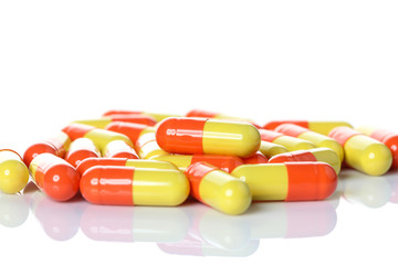 Opened pill with medicine powder