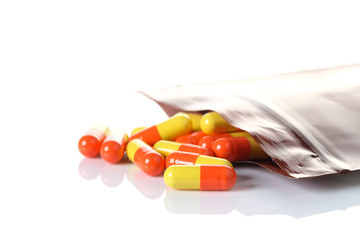 Opened pill with medicine powder