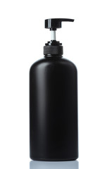  plastic bottles of body care and beauty products on white