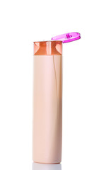  plastic bottles of body care and beauty products on white