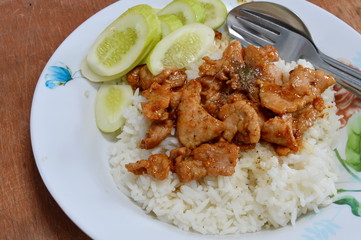 fried pork with garlic on rice