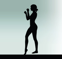 woman silhouette with hand gesture power and might