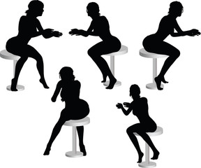 woman silhouette with sitting pose leaning on table