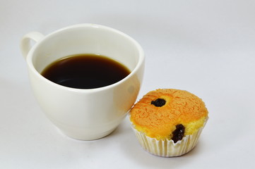 butter cup cake and black coffee