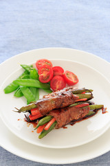 Vegetable wrapped by meat  with Teriyaki sauce