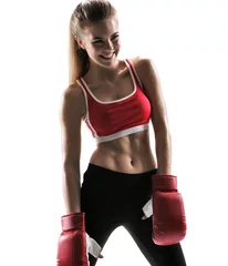 Abwaschbare Fototapete Kampfkunst Cheerful sweaty Tae Bo instructor with boxing gloves 