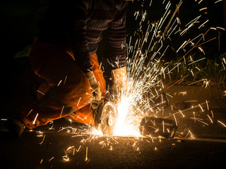 Worker cutting tracks for maintenance