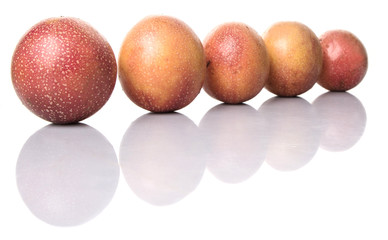 Passion fruit over white background