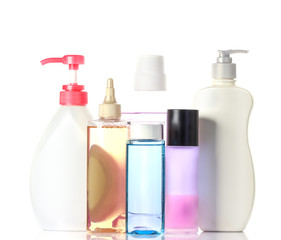 plastic bottles of body care and beauty products