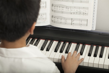 piano lesson, Asian boy kid activity playing piano with notes