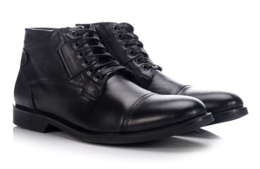 Classic men's lace-up shoes on a white background