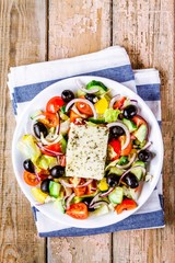 Greek salad of organic tomatoes, cucumber, and feta cheese